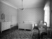 Residenset i Växjö. Interiör av sovrum / gästrum. Ca. 1920.