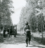 Maskerade skogis-elever i skogen runt Garpenberg, 1945