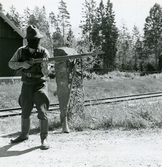 Skogis-eleven Falken med musköt, 1945