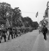 Hantverkets dag. En musikkår m.m. är på väg längs Kronobergsgatan söderut.