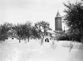 Ingelstad säteri med utsiktstorn, parken i vinterskrud. Tidigt 1900-tal.