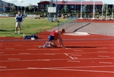 Friidrottsarenan Åby Friidrott i Åby, Mölndal, i juli 1996. En löpare gör sig redo för start.