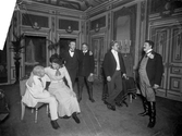 Teatergrupp på scen i Växjö, ca. 1912.