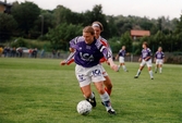 Fotbollslaget Jitex BK spelar match mot Landvetter IF på Kvarnbyvallen i Mölndal, år 1996. Matchen slutade 1-1.