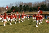 Kvarnbyvallen i Mölndal, år 1997.  Mölndals Paradorkester underhåller på fotbollsplanen.