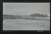 Vy över åkerlandskap på landsbygden vår/ vintertid. 
