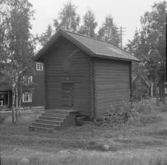 Borlänge, Torsång, Ornäs. Härbre 42 b över dörren. 1921-1926.