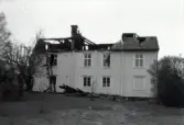 Brandskadad fastighet på Sevedegatan i Vimmerby.