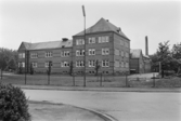 Vänersborg. Vänerskolan fotograferad från Korsgatan