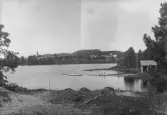 Fjällsjöälven med Fjällsjö kyrka på andra sidan.