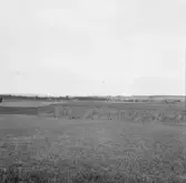Borlänge, Stora Tuna, Nyby. Hedgårdarna och kyrkan i bakgrunden.