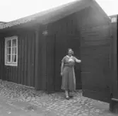 Falun, gammal gård i hörnet av Engelbrektsgatan och Herrgårdsgränd 1934.