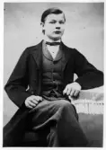 Porträtt av rådman Alfred Ericsson som ung.