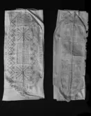 2 st långörngott med broderade örngottshuvor.
Örngottshuva, korssöm märkt 