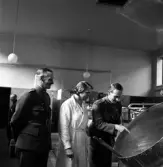 Kamratmötet, I 11. Middag på regementet. 