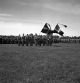 Kamratmötet, I 11. Samling på övningsfältet. Hederskompaniet med regementets fanor.