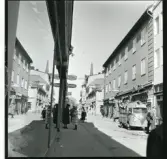 Västerås, Centrum, kv. Kettil.
Köpmangatan mot norr 1964.