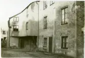 Västerås, Centrum, kv. Klas.
Rivningshus vid Smedjegatan. 1929-1930.