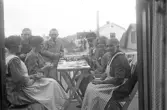 Kaffebjudning på balkongen, 1920-tal