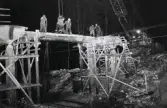 Skånska Cement (Skanska) river bron vid I11:s sydvästra grind.
Våren 1970.