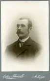 Porträtt av man från Lillkyrka med yviga mustacher, 1905