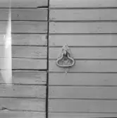 Falun, Sundbornsbyn. Sundborn, portring på telefonstation, Sundbornsbyn.