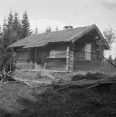 Falun, Finngärds, Sundborn. Logrens stes* vid Övervalls tjärn.
*Enklare hus