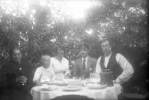 Familjemiddag i bersån, 1920-tal