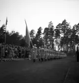 Svenska Flaggans dag, 6/6 1941. 
Inmarsch med Växjös lottakår på Värendsvallen.