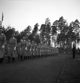 Svenska Flaggans dag, 6/6 1941. 
Inmarsch med Växjös lottakår på Värendsvallen.