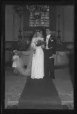 Bröllopsporträtt, i kyrkan. Lennart Rippert. Ur Gustaf Åhmans samling.