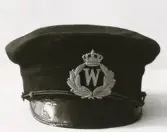 Polismössa för poliskonstapel, med mössmärke i form av W (Wexiö) under krona, ca 1920-25.