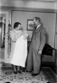 Man och kvinna med dopbarn, Alunda, Uppland