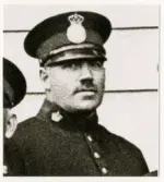 Poliskonstapel Ernst Johansson, Växjö, 1937.
Utsnitt ur större foto, visande Växjö poliskår.