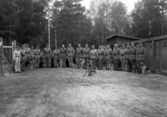 Hundförare vid hundgård.
I 11, Växjö