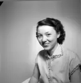 Porträtt av fru/fröken Gustafsson.