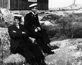 Två män på klippa