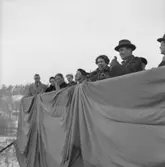 Dop och sjösättning av fartyget 154 M/S Karin Thordén.Fartygets gudmor på tribunen.