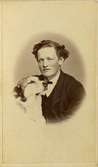 Handlande A. W. Rydholm med hunden Pan