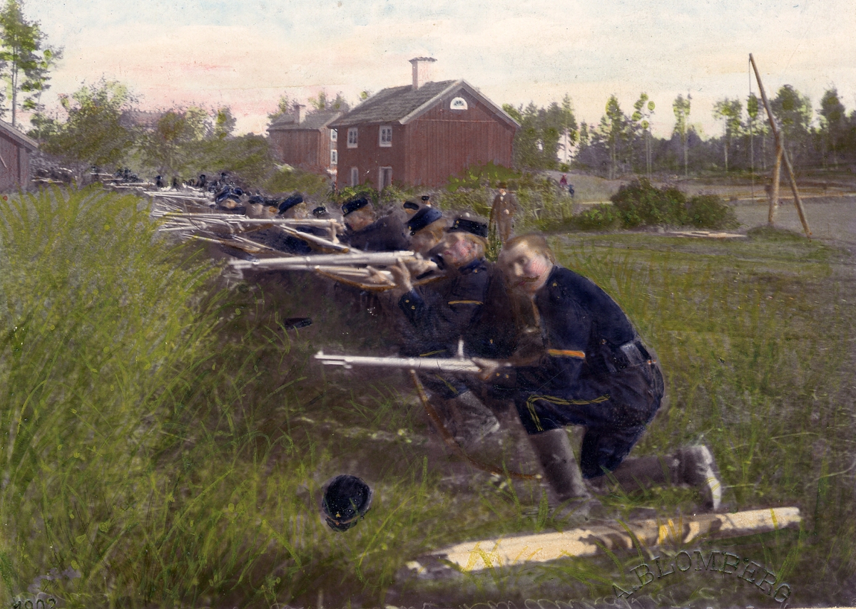 Anton Ambrosius Blomberg, Soldiers from the Second Svea Artillery Regiment A 5 are shot-ready with rifles in a shooting line at a farmhouse (?). Civil spectators look at in the background. Coloured photo from 1902.