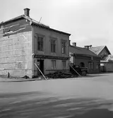 Kvarter Diplomaten i Jönköping med Wilhelm Enanders Bokbinderi år 1953. I bakgrunden skymtar taket Frälsningsarmens tempel, som före år 1897 varit gamla ridhuset.