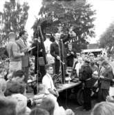 Auktion med Lennart Hyland vid Huskvarna stads 50-årsjubileum år 1961.