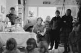 Familjesöndag på Mölndals museum den 20 november 1988 (efter 2011-01-01 Mölndals stadsmuseum). Gatuadressen ändrades 1997 till Norra Forsåkersgatan 19. 
Sång och danslekar med Linda Olsbjörk. Dramatisering av fattigauktion med Susanne Brånålt. Dockteater av Skånhällaskolan.