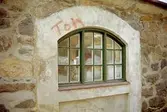 Fönster på stenladan
