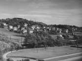 Flygfoto från nordväst över stadsdelen Trädgården och Störtfjället, okänt årtal.