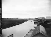 Vy över Fyrisån och järnvägsbron, Luthagen och Svartbäcken, Uppsala 1900 - 1901