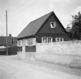 Nygatan
Visby, Gotland
Exteriör

Svensk arkitektur: kyrkor, herrgårdar med mera fotograferade av Arkitekturminnesföreningen 1908-23.