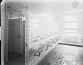 Industribyggnad, Köping
Tvättrum med handfat och duschar
Interiör