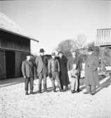 Öster Ledinge sågverk
Gruppbild med sex män och ett barn
Exteriör