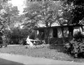 Källarmästare Palmer vid paviljong bakom Stadshotellet i Vetlanda.